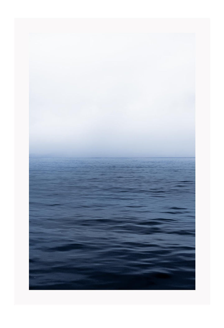 Photography print with ripples in water and ombre blue to white cloud